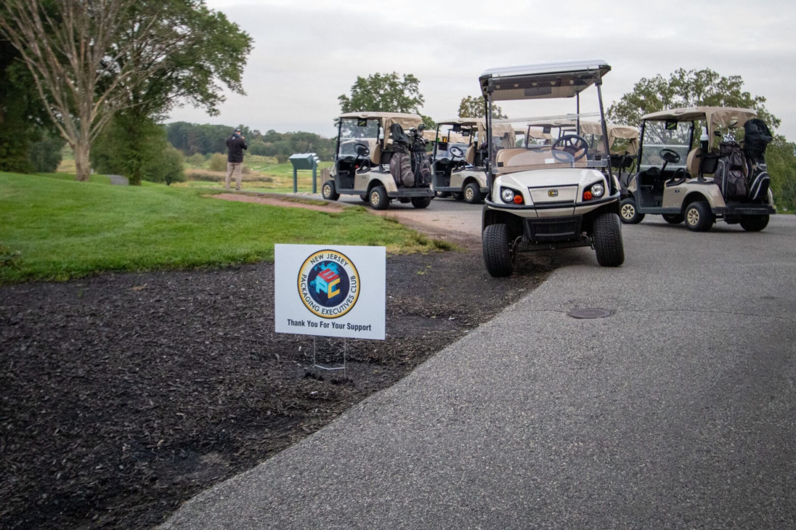 appreciation sign and golf carts