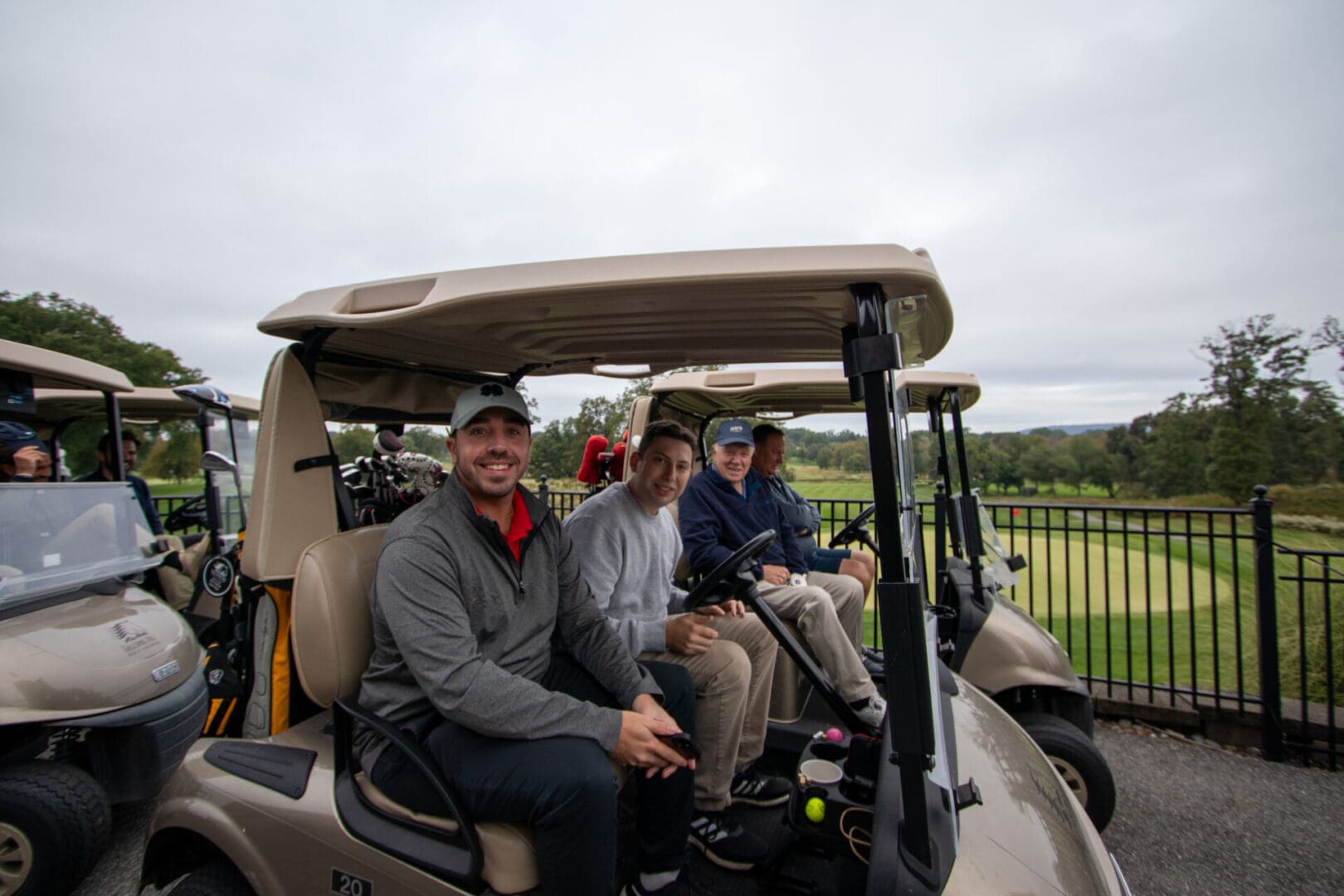 men in golf carts