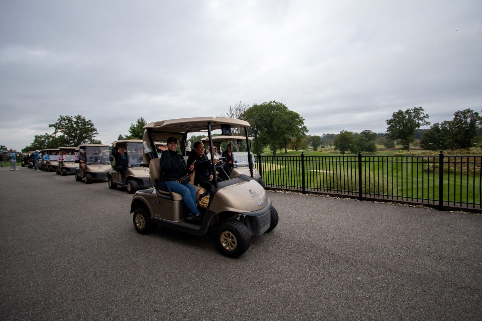 a convoy of golf carts